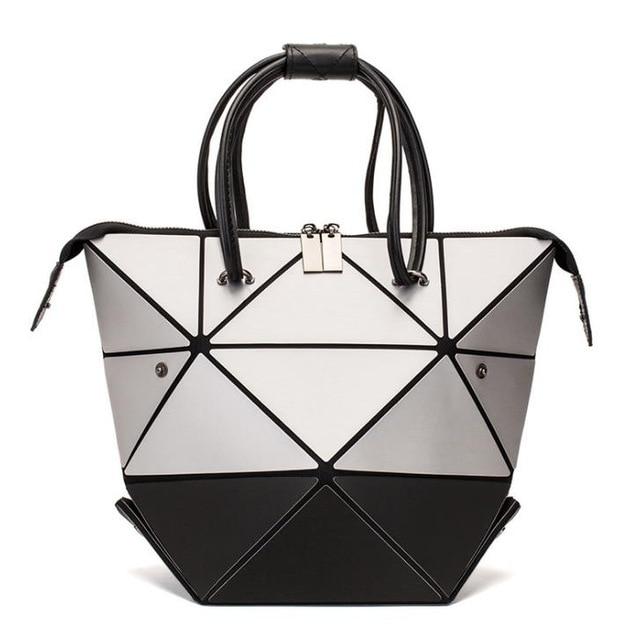 Reflektinė-spalvas-keičianti-rankinė-'4 viename'