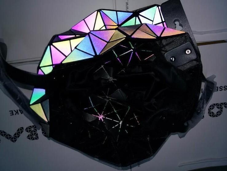 Reflektinė-spalvas-keičianti-rankinė-'Saulė'