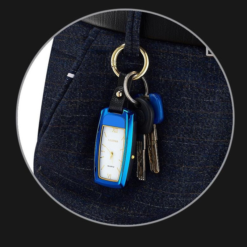 Raktų-pakabukas-su-laikrodžiu-ir-žiebtuvėliu