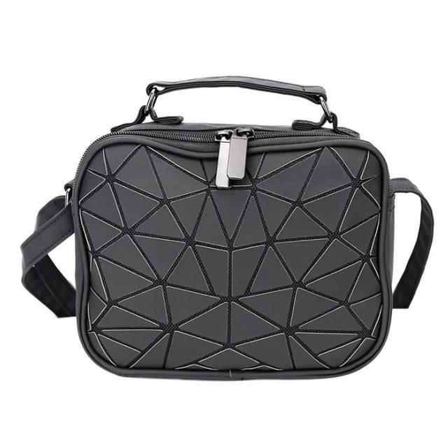 Reflektinė-spalvas-keičianti-rankinė-'Mini'